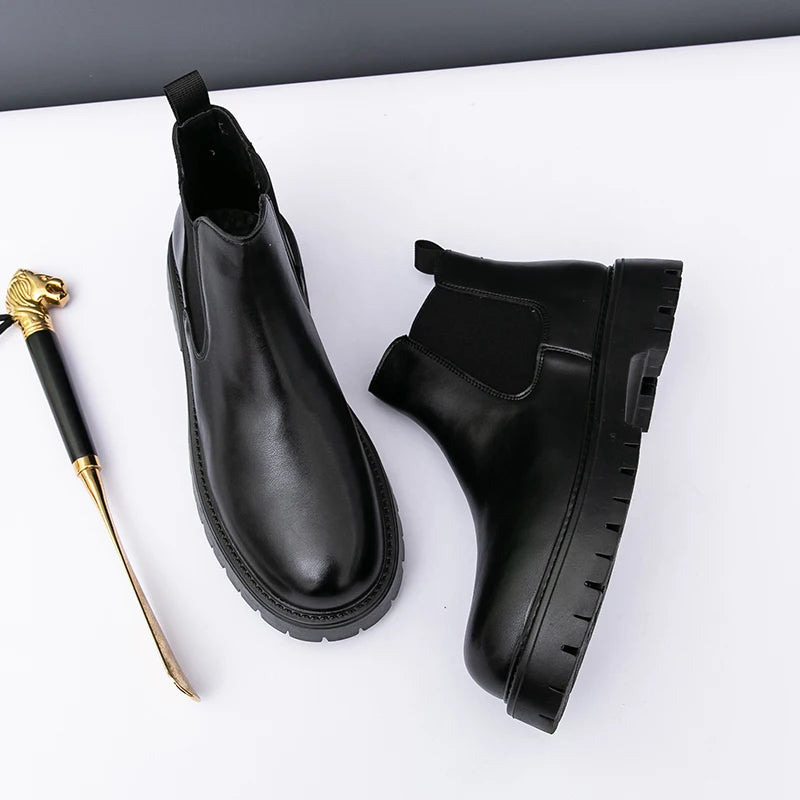Brown MALEVA Chelsea leather boots with elastic side panels and sturdy sole, stylish and versatile for casual or dressy wear.