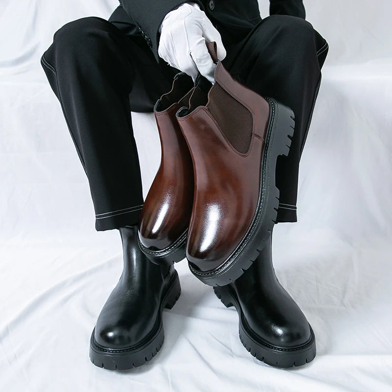 Brown MALEVA Chelsea leather boots with classic elastic side panels and sleek design, perfect for casual or dress wear.