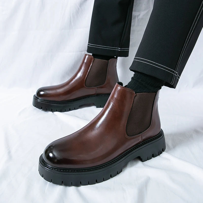 Brown MALEVA Chelsea leather boots with elastic side panels and sleek design, perfect for stylish everyday wear.