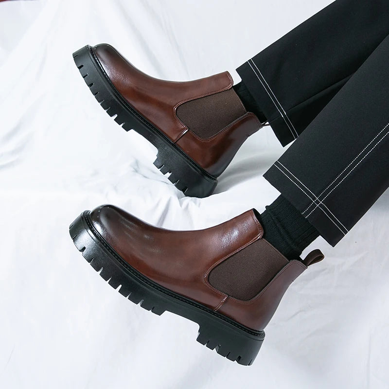 Brown MALEVA Chelsea leather boots with elastic side panels and sleek design, perfect for stylish everyday wear.