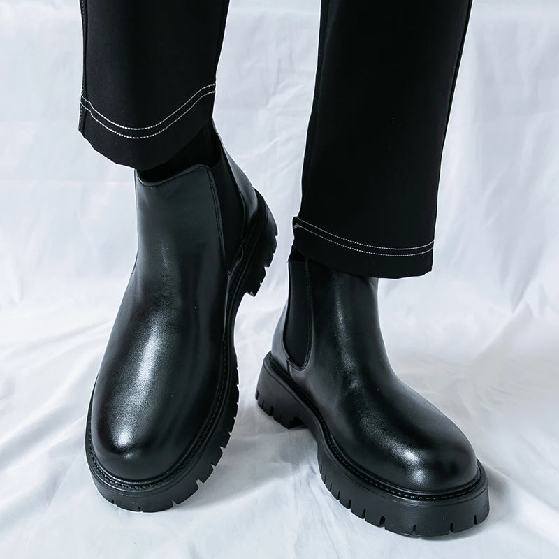 Brown MALEVA Chelsea leather boots with elastic side panels and sleek design, ideal for stylish, comfortable footwear.