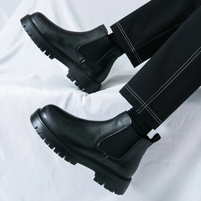Brown MALEVA Chelsea leather boots with elastic side panels and rounded toes, stylish and versatile footwear for men.