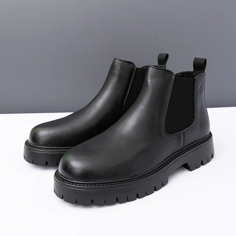 Brown MALEVA Chelsea leather boots with elastic side panels and sturdy sole, stylish and durable footwear for casual or formal wear.