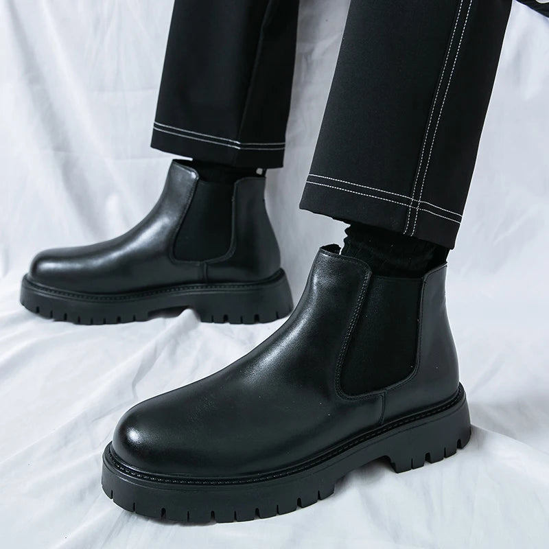 Brown MALEVA Chelsea leather boots with elastic side panels and sturdy soles, stylish and versatile footwear for casual or formal wear.