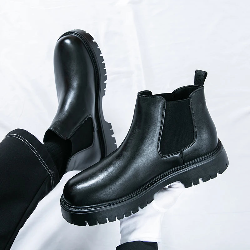 Brown MALEVA Chelsea leather boots with elastic side panels and low heel, stylish and versatile footwear for casual or formal wear.